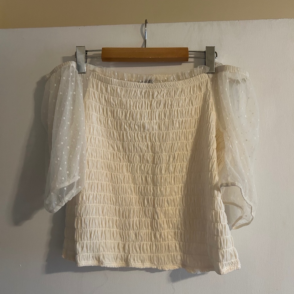 Torrid’s top cream